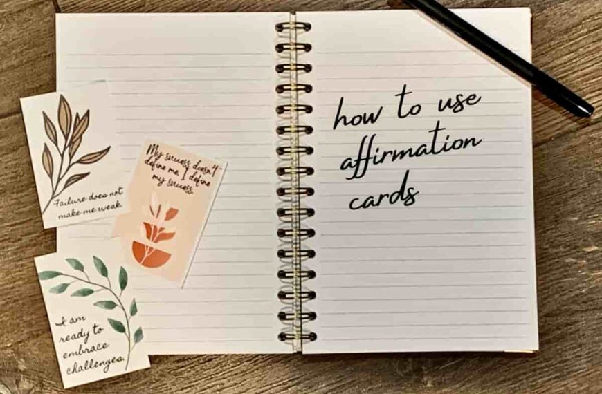 affirmation cards placed on a journal