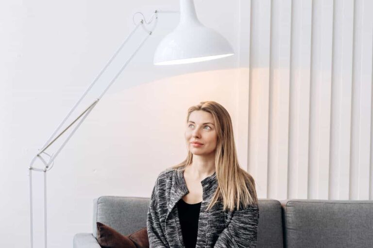 a woman with a lightbulb above her head