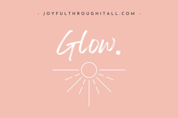 the word 'glow' written above a sunshine