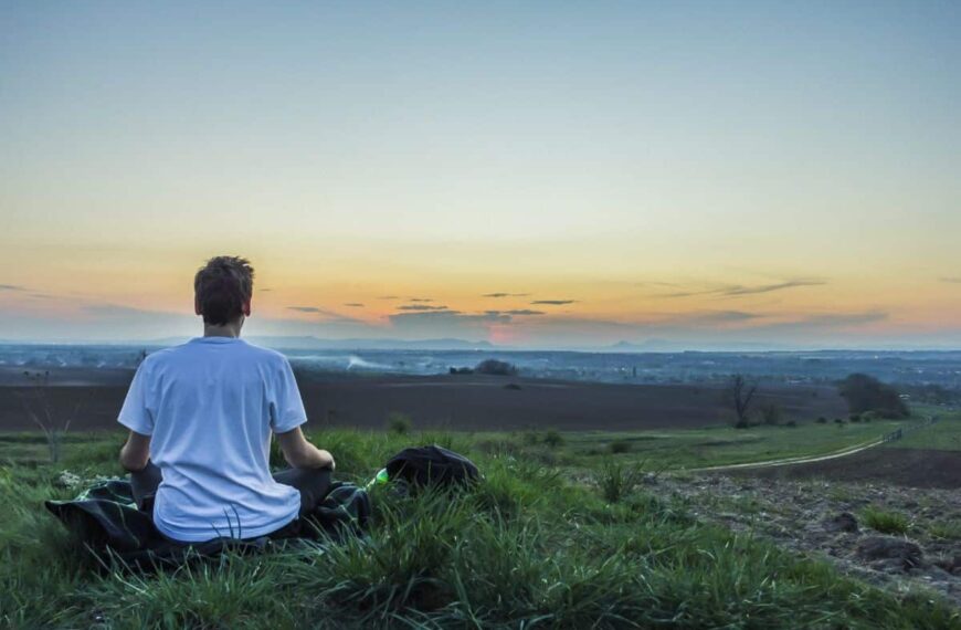 a man watching the sunset